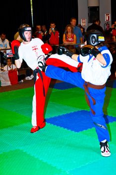 CHICLANA DE LA FRONTERA, SPAIN-NOV 05: Unidentified players compete in the 3rd World Karate and Kickboxing Council championship  on Nov 05, 2011, in Chiclana de la Frontera,  Spain