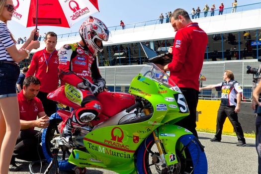 JEREZ DE LA FRONTERA, SPAIN - APR 17: 125cc motorcyclist Juanfran Guevara waiting on the starting gates in the CEV Championship race on April 17, 2011 in Jerez de la Frontera, Spain.