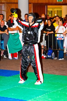 CHICLANA DE LA FRONTERA, SPAIN-NOV 05: Unidentified player compete in the 3rd World Karate and Kickboxing Council championship  on Nov 05, 2011, in Chiclana de la Frontera,  Spain