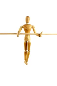 A Manikin waling a tightrope