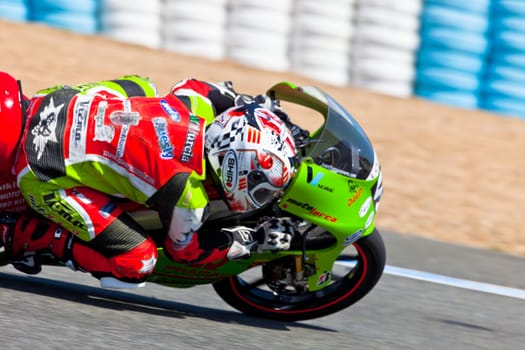 JEREZ DE LA FRONTERA, SPAIN - APR 17: 125cc motorcyclist Juanfran Guevara takes a curve in the CEV Championship race on April 17, 2011 in Jerez de la Frontera, Spain.