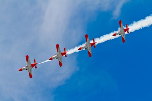 CADIZ, SPAIN-SEP 9: Aircrafts of the Patrulla Aguila taking part in a test on the 4th airshow of Cadiz on Sep 9, 2011, in Cadiz, Spain