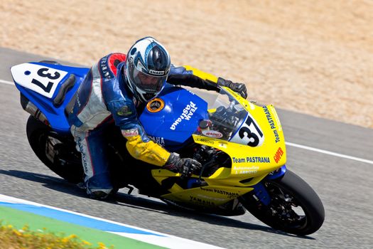 JEREZ DE LA FRONTERA, SPAIN - APR 17: Stock Extreme motorcyclist Jorge Arroyo takes a curve in the CEV Championship race on April 17, 2011 in Jerez de la Frontera, Spain