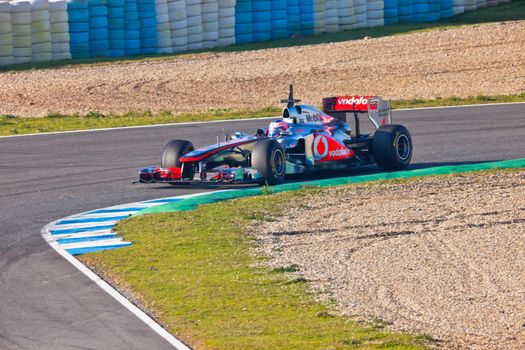 JEREZ DE LA FRONTERA, SPAIN - FEB 11: Jenson Button of McLaren F1  takes a curve on training session on February 11 , 2011, in Jerez de la Frontera , Spain