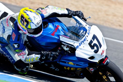 JEREZ DE LA FRONTERA, SPAIN - APR 17: Stock Extreme motorcyclist Ferran Casas takes a curve in the CEV Championship race on April 17, 2011 in Jerez de la Frontera, Spain