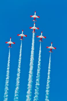 CADIZ, SPAIN-SEP 9: Aircrafts of the Patrulla Aguila taking part in a test on the 4th airshow of Cadiz on Sep 9, 2011, in Cadiz, Spain