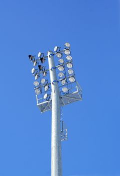 Stadium lights, photo on background of blue sky