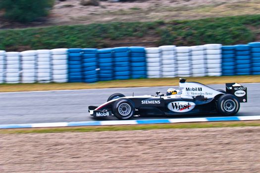 JEREZ DE LA FRONTERA, SPAIN - DEC 04: Pedro de la Rosa of McLaren Mercedes F1 races during a training session on December 04, 2004, in Jerez de la Frontera, Spain