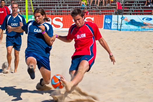 CADIZ, SPAIN -  JUL 30:  Unknown players of the team of Cadiz and Gijon playing the Spanish Championship of Beach Soccer on Jul 30, 2005 on the beach of La Victoria in Cadiz, Spain