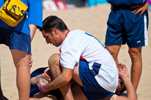 CADIZ, SPAIN -  JUL 30:  Unknown players of the team of Cadiz playing the Spanish Championship of Beach Soccer on Jul 30, 2005 on the beach of La Victoria in Cadiz, Spain
