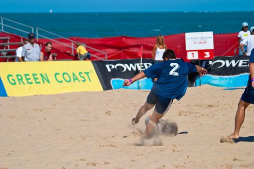 CADIZ, SPAIN -  JUL 30:  Unknown player of the team of Cadiz playing the Spanish Championship of Beach Soccer on Jul 30, 2005 on the beach of La Victoria in Cadiz, Spain