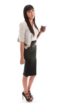 A young successful businesswoman wearing black skirt and striped blouse.  