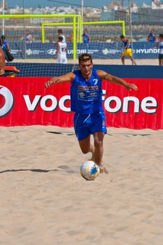 CADIZ, SPAIN -  JUL 22:  Unknown player of unknown team playing the Spanish Championship of Beach Soccer on Jul 22, 2006 on the beach of La Victoria in Cadiz, Spain