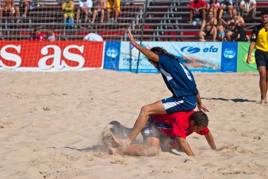 CADIZ, SPAIN -  JUL 30:  Unknown players of the team of Cadiz and Gijon playing the Spanish Championship of Beach Soccer on Jul 30, 2005 on the beach of La Victoria in Cadiz, Spain