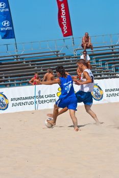 CADIZ, SPAIN -  JUL 22:  Unknown players of unknown team playing the Spanish Championship of Beach Soccer on Jul 22, 2006 on the beach of La Victoria in Cadiz, Spain