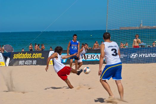 CADIZ, SPAIN -  JUL 22:  Unknown players of unknown team playing the Spanish Championship of Beach Soccer on Jul 22, 2006 on the beach of La Victoria in Cadiz, Spain