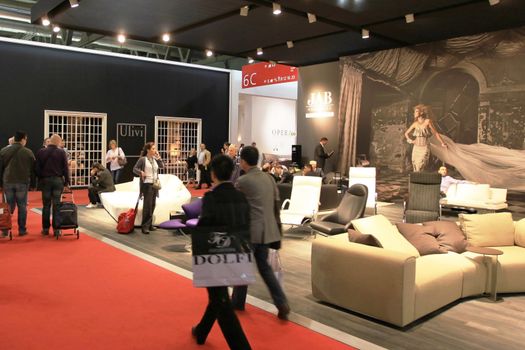 Looking at interior design and architecture solutions during Salone del Mobile 2011, international furnishing accessories tradeshow.