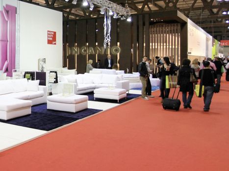 Looking at interior design and architecture solutions during Salone del Mobile 2011, international furnishing accessories tradeshow.