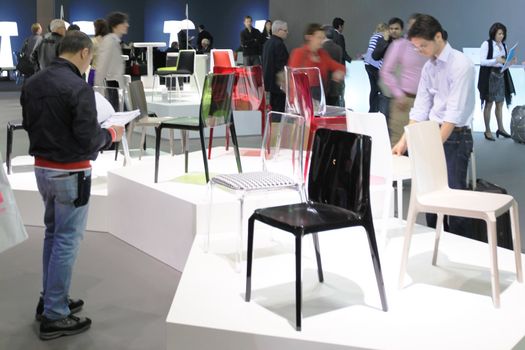 Looking at interior design and architecture solutions during Salone del Mobile 2011, international furnishing accessories tradeshow.