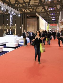 Looking at interior design and architecture solutions during Salone del Mobile 2011, international furnishing accessories tradeshow.