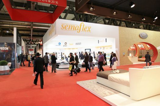 Looking at interior design and architecture solutions during Salone del Mobile 2011, international furnishing accessories tradeshow.