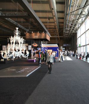 Looking at interior design and architecture solutions during Salone del Mobile 2011, international furnishing accessories tradeshow.