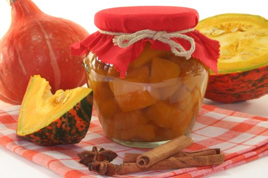 a glass pumpkin compote and fresh ingredients