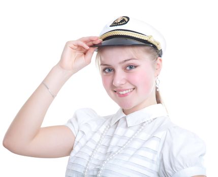 Beautiful girl in the captain's cap. Isolated on white background