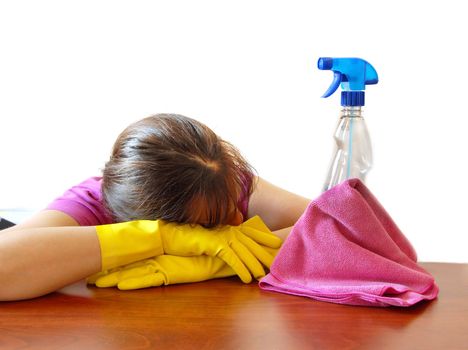 young woman in rubber gloves  leaning on desk, bored of cleaning