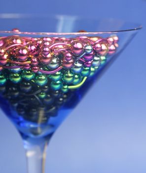 A martini glass full of titanium navel rings