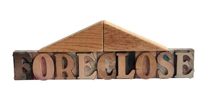 the word 'foreclose' with a roof made of blocks