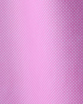 white polka dots on a curved pink background