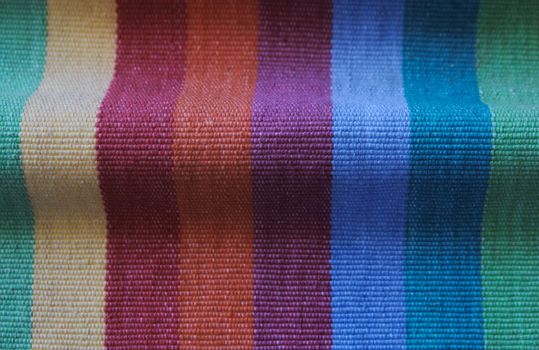 curving fabric in bright, cheerful multicolored shades