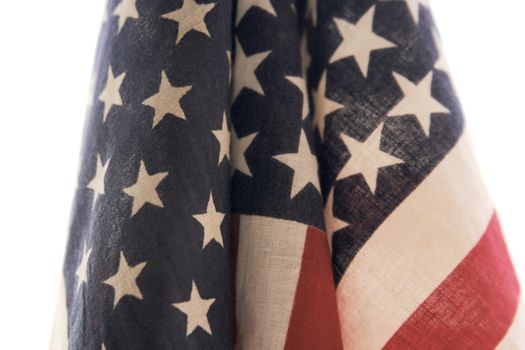 a view up close of American flags draped together