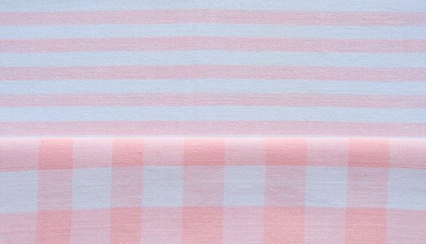 orange and white fabric in stripes and checks