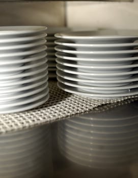 dishes just washed ready for after dinner coffee, bar station