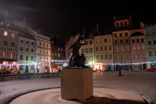 lights and christmas decorations on warsaw old townrestaurants