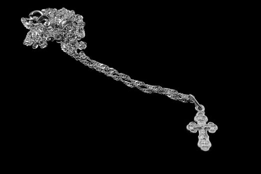Silver chain with a dagger. The crucifixion