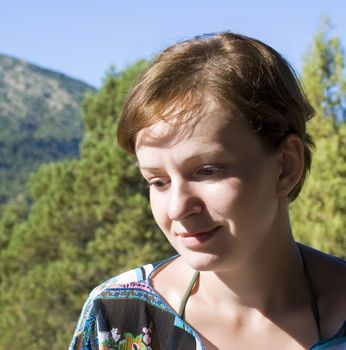 Reflections. A portrait of the young girl with emotion on the person - reflection