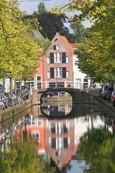 Canal and historic houses in Delft, Holland