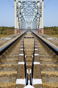 The railway bridge through the river. East Ukraine. The river - Severski Donets