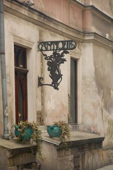 Remains of an old antigue shop hidden in one of Krakow streets. 