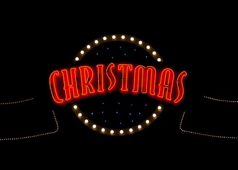 Christmas neon light sign in the night