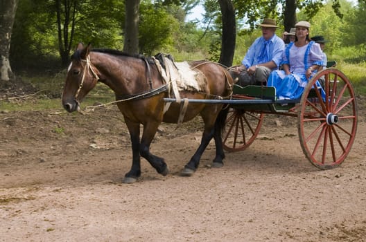 TACUAREMBO, URUGUAY - MAR 5 : Participants in the annual festival "Patria Gaucha" on March 5, 2011 in Tacuarembo, Uruguay. It is one of the biggest festival in South America to celebrate gaucho culture