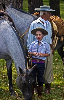 TACUAREMBO, URUGUAY - MAR 5 : Participants in the annual festival "Patria Gaucha" on March 5, 2011 in Tacuarembo, Uruguay. It is one of the biggest festival in South America to celebrate gaucho culture