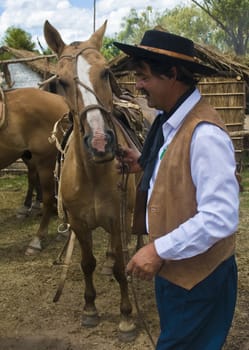 TACUAREMBO, URUGUAY - MAR 5 : Participant in the annual festival "Patria Gaucha" on March 5, 2011 in Tacuarembo, Uruguay. It is one of the biggest festival in South America to celebrate gaucho culture