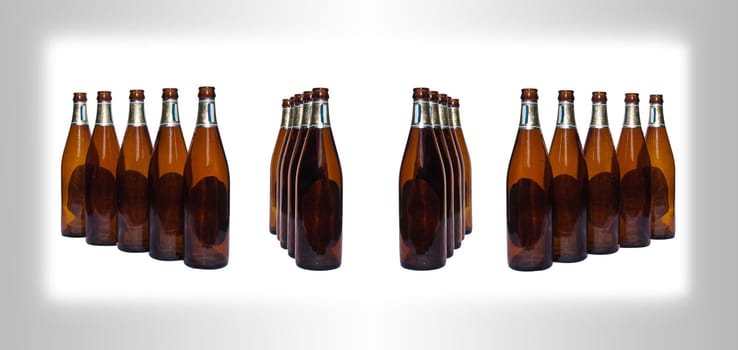 Empty beer bottles isolated over white background