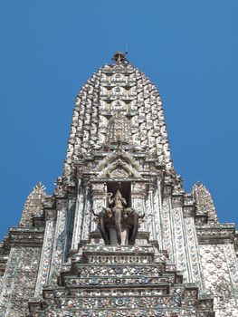 Phar Prang in Wat Arun (Temple of Dawn) decorate with faithful statue, Bangkok, Thailand