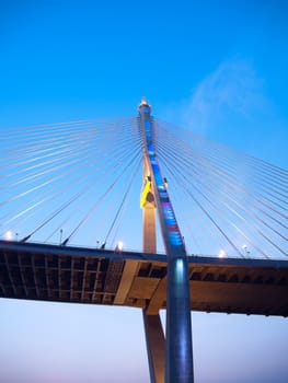 Bhumibol Bridge also casually call as Industrial Ring Road Bridge illuminate with spotlight and twilight sky, Samut Prakarn,Thailand