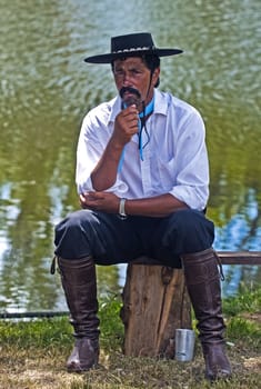 TACUAREMBO, URUGUAY - MAR 5 : Participant in the annual festival "Patria Gaucha" on March 5, 2011 in Tacuarembo, Uruguay. It is one of the biggest festival in South America to celebrate gaucho culture